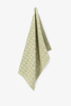 Lichtgroene handdoek met hartjes print