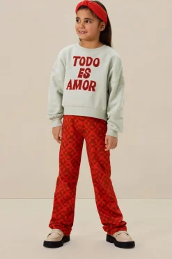 Lichtgroene sweater met tekst