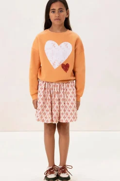 Lichtoranje oversized sweater met artwork