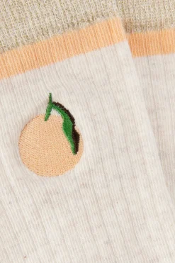 Lichtoranje sokken met sinaasappel embroidery