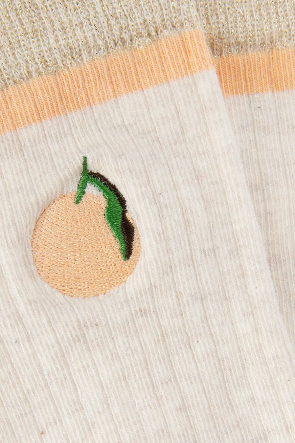 Lichtoranje sokken met sinaasappel embroidery