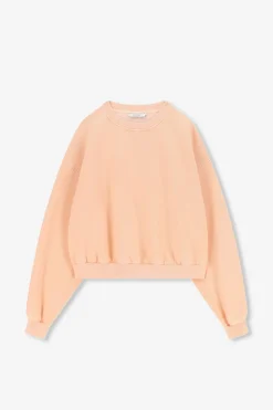 Lichtoranje sweater met pofmouwen