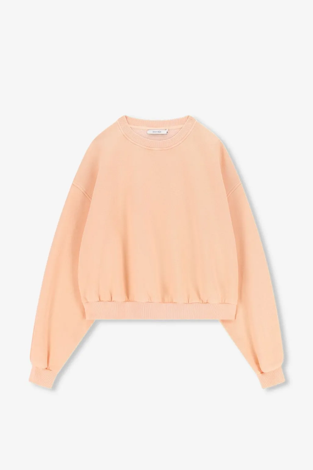 Lichtoranje sweater met pofmouwen