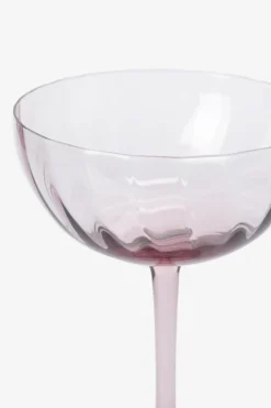 Lichtpaarse champagneglazen scallop