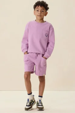Lichtpaarse sweater met artwork
