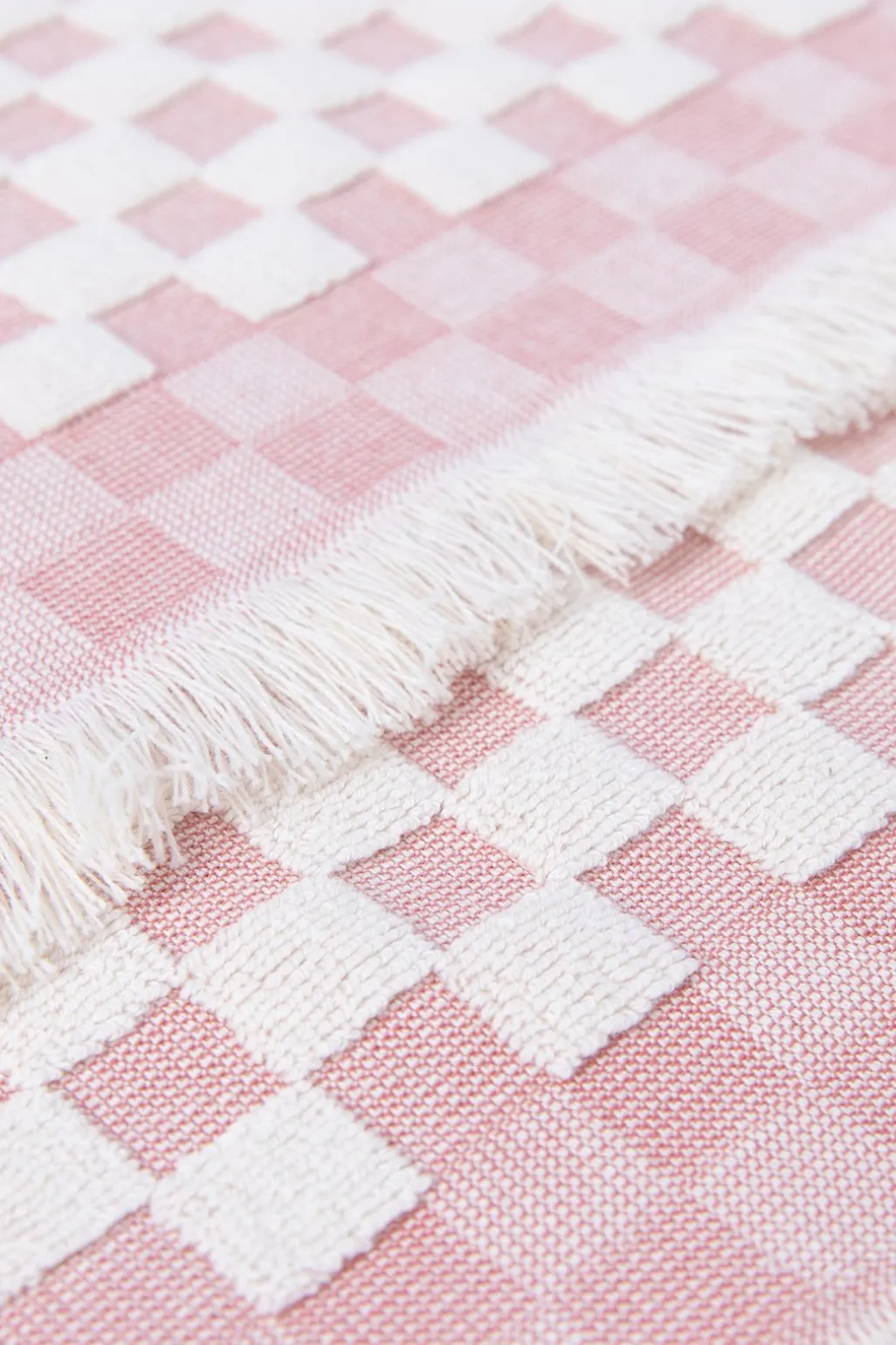 Lichtroze geblokte gastendoek