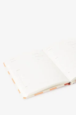 Oranje geblokt receptenboek