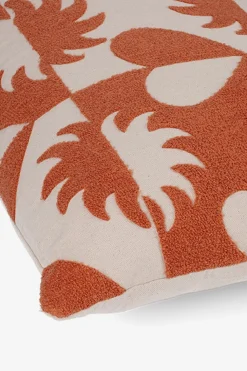 Oranje kussen met dessin