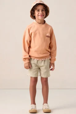 Oranje sweater met artwork