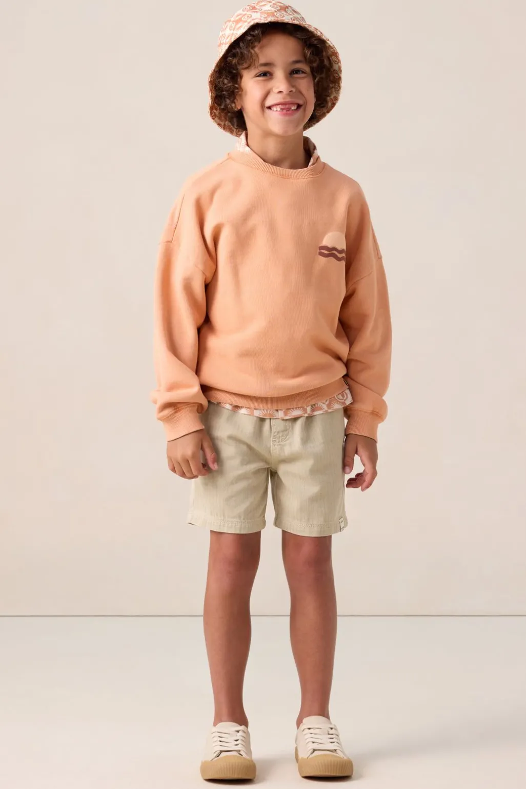 Oranje sweater met artwork
