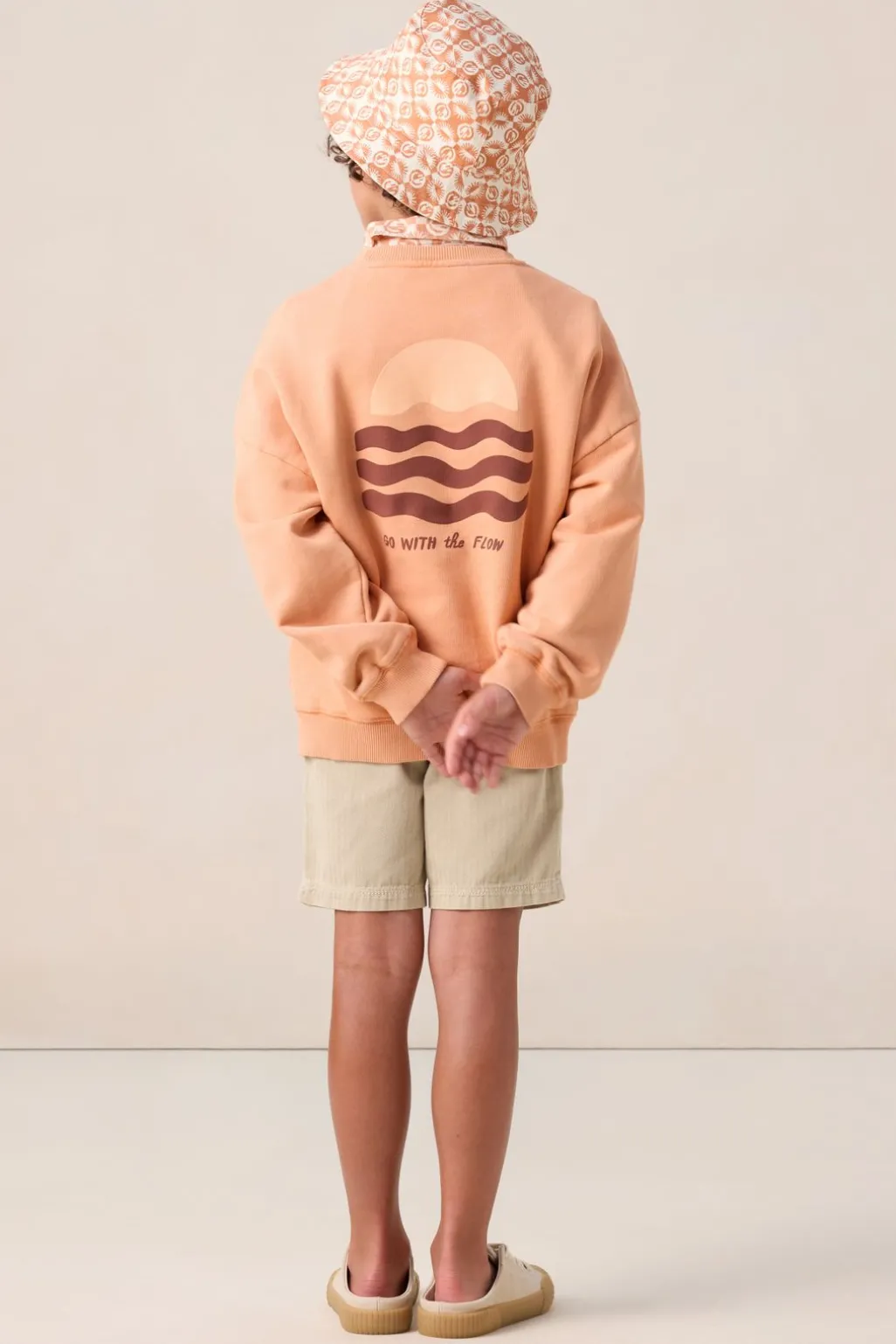 Oranje sweater met artwork