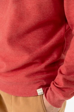 Rode sweater met hoge hals