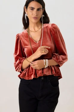 Rode velvet peplum top