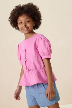 Roze blouse met striksluiting