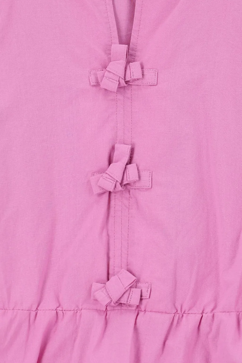 Roze blouse met striksluiting