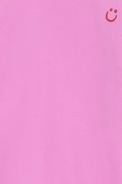 Roze oversized sweater met ruffles