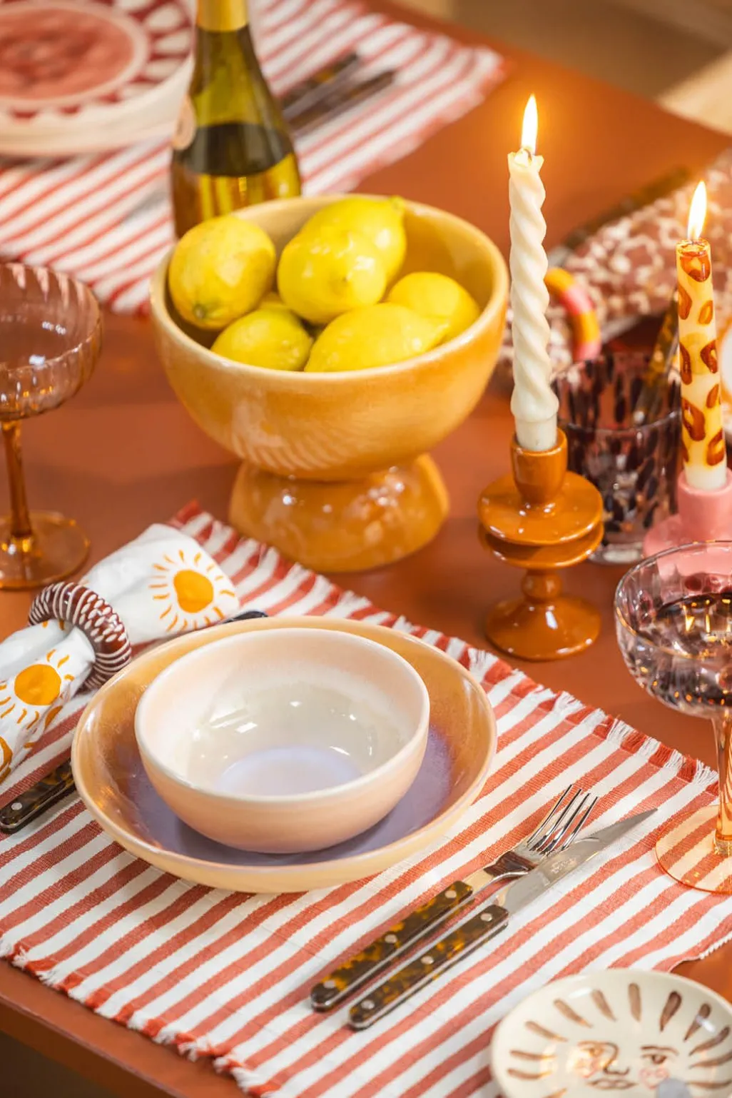 Set van 2 oranje gestreepte placemats