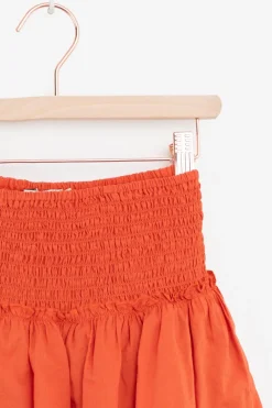 Warm oranje rok met smock details