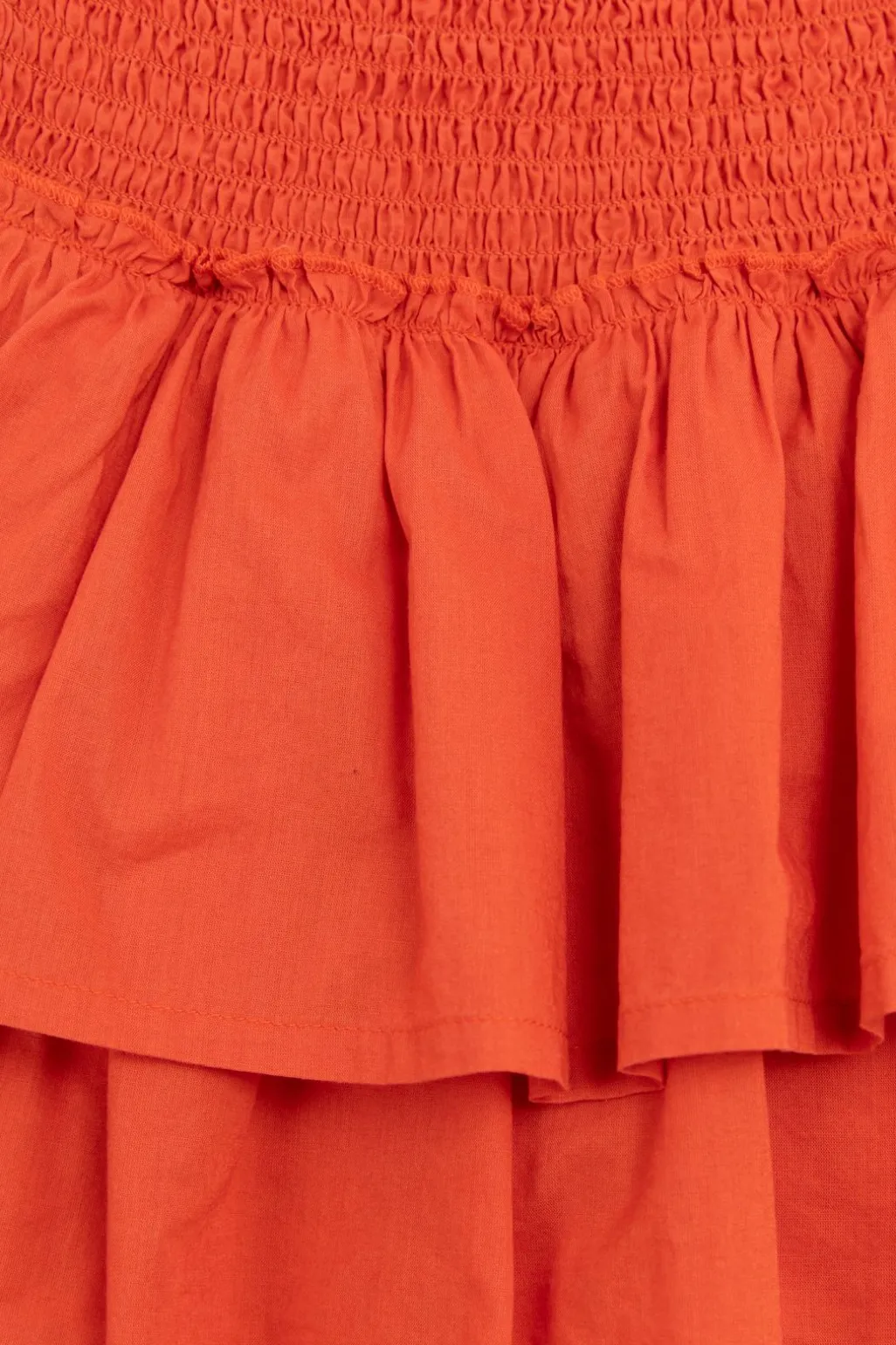 Warm oranje rok met smock details