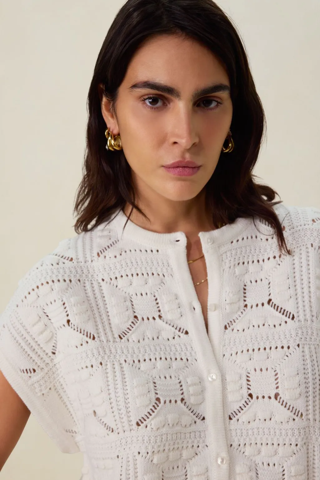 Wit mouwloos crochet vest