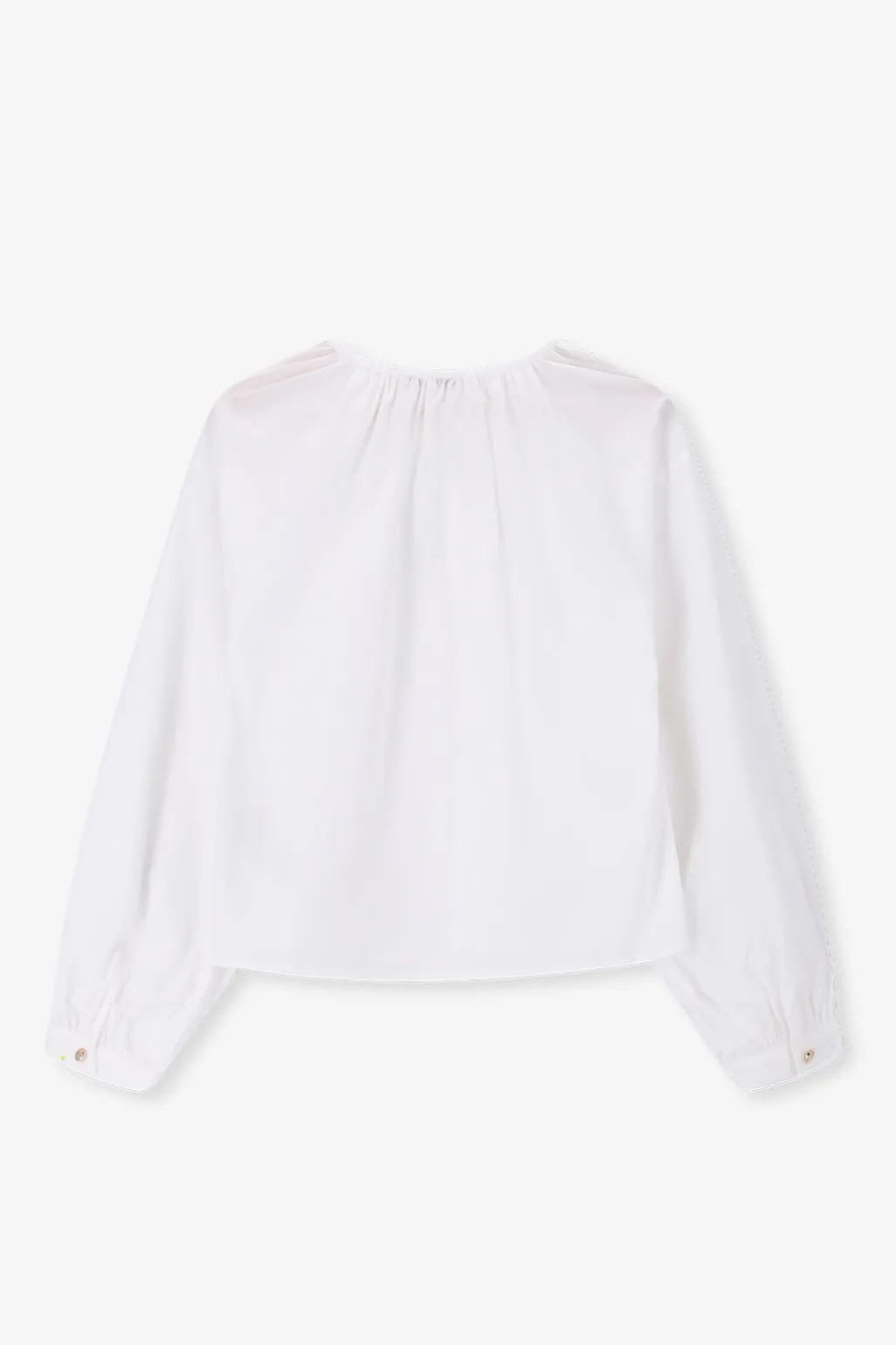 Witte blouse met knoopdetail