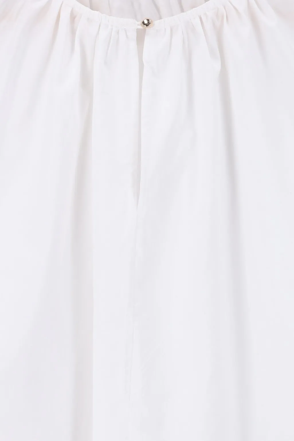 Witte blouse met knoopdetail