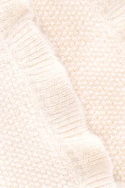 Witte gebreide spencer met ruffles