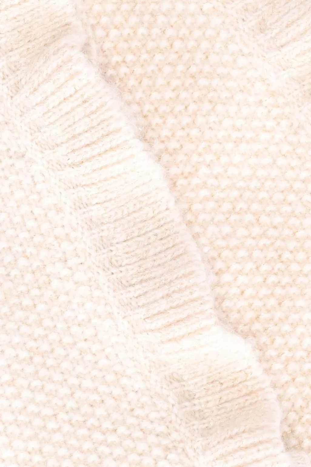 Witte gebreide spencer met ruffles