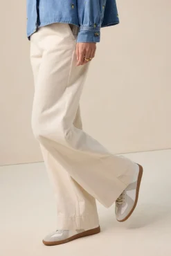 Witte high waist wide leg jeans met rits