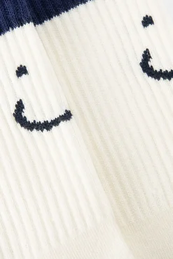 Witte sokken met smiley