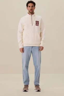 Witte sweater met rits en artwork